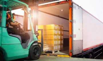 long haul truck being loaded with freight