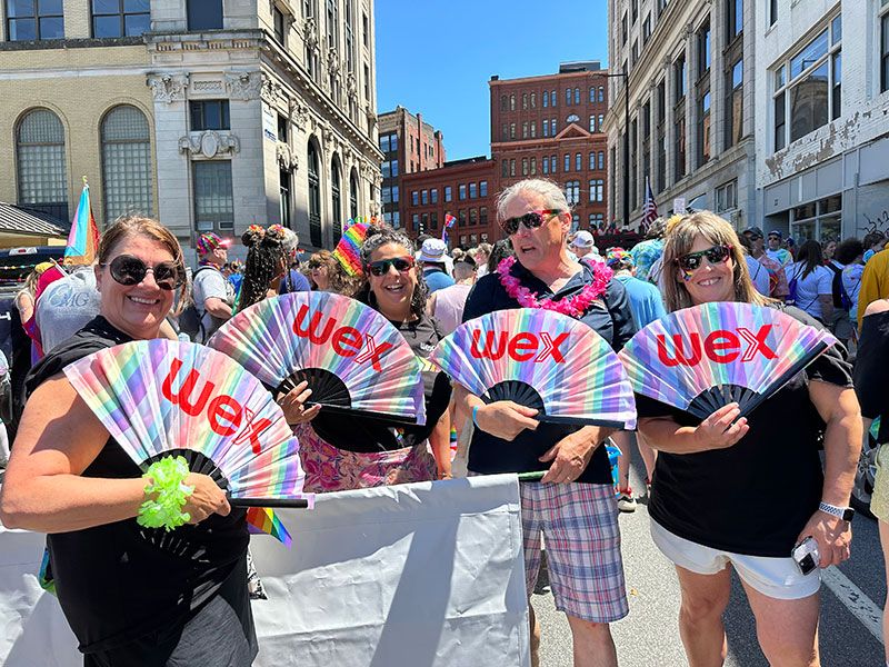 WEXers with Pride parade fans