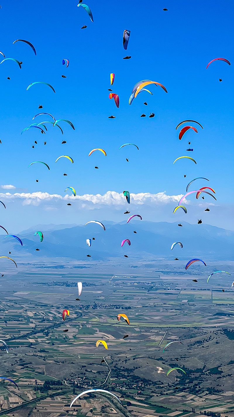 Paragliders use columns of warm air 