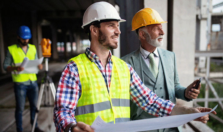 Construction workers discussing build plans